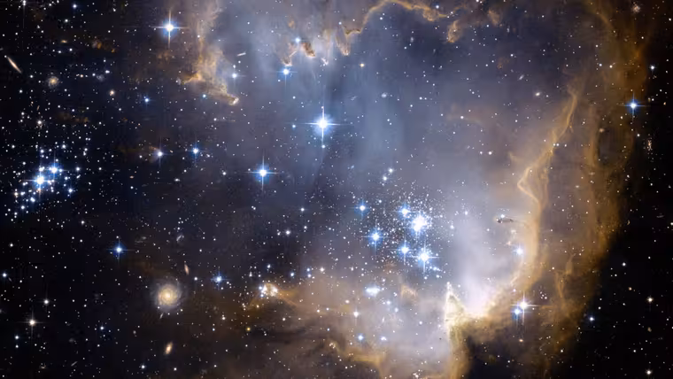Hvězdokupa NGC 602 otevírá pohled do vzdáleného vesmíru