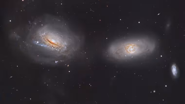 Galaxie NGC 3169 odhalila pokřivená prachová vlákna