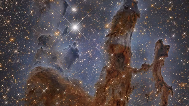 Hubble pronikl infračerveným světlem do pilířů Orlí mlhoviny