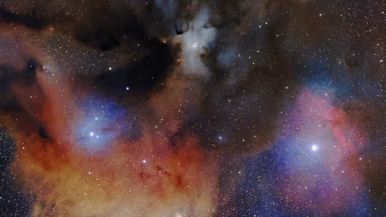 Barevná oblaka Rho Ophiuchi připomínají cukrovou vatu